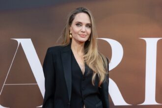 Angelina Jolie Puts a Festive Twist on the Holiday Suit