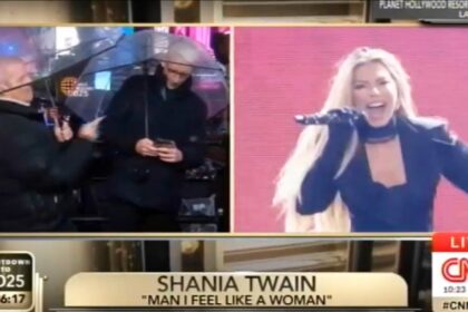 Andy Cohen calls out Anderson Cooper for being on his phone during Shania Twain’s New Year’s Eve performance