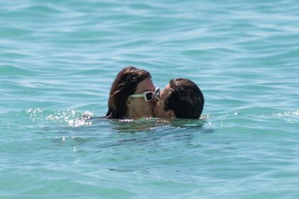 Shredded Mark Wahlberg and bikini-clad wife Rhea Durham pack on PDA during Barbados vacation