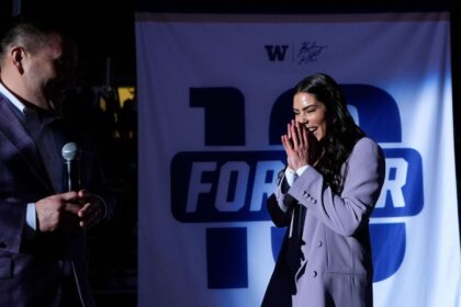 Plum’s No. 10 1st women’s jersey in UW rafters