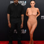 Kanye’s wife Bianca Censori wears extremely NSFW slip dress with nothing underneath on Grammys red carpet