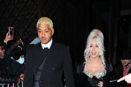 Cher, 78, and boyfriend Alexander ‘AE’ Edwards, 39, cozy up on ‘SNL 50’ anniversary special red carpet