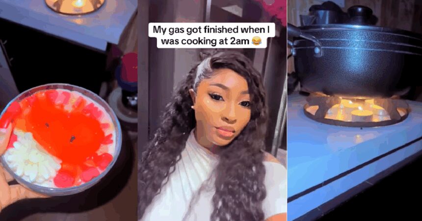 “Candlelight dinner no pass like this” – Lady resorts to using candles after her gas finished while she was cooking at 2 a.m (WATCH)