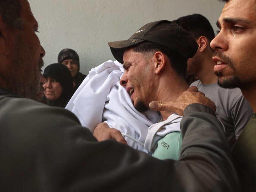 Six trapped under rubble after Israeli attack on Gaza City shelter kills 13